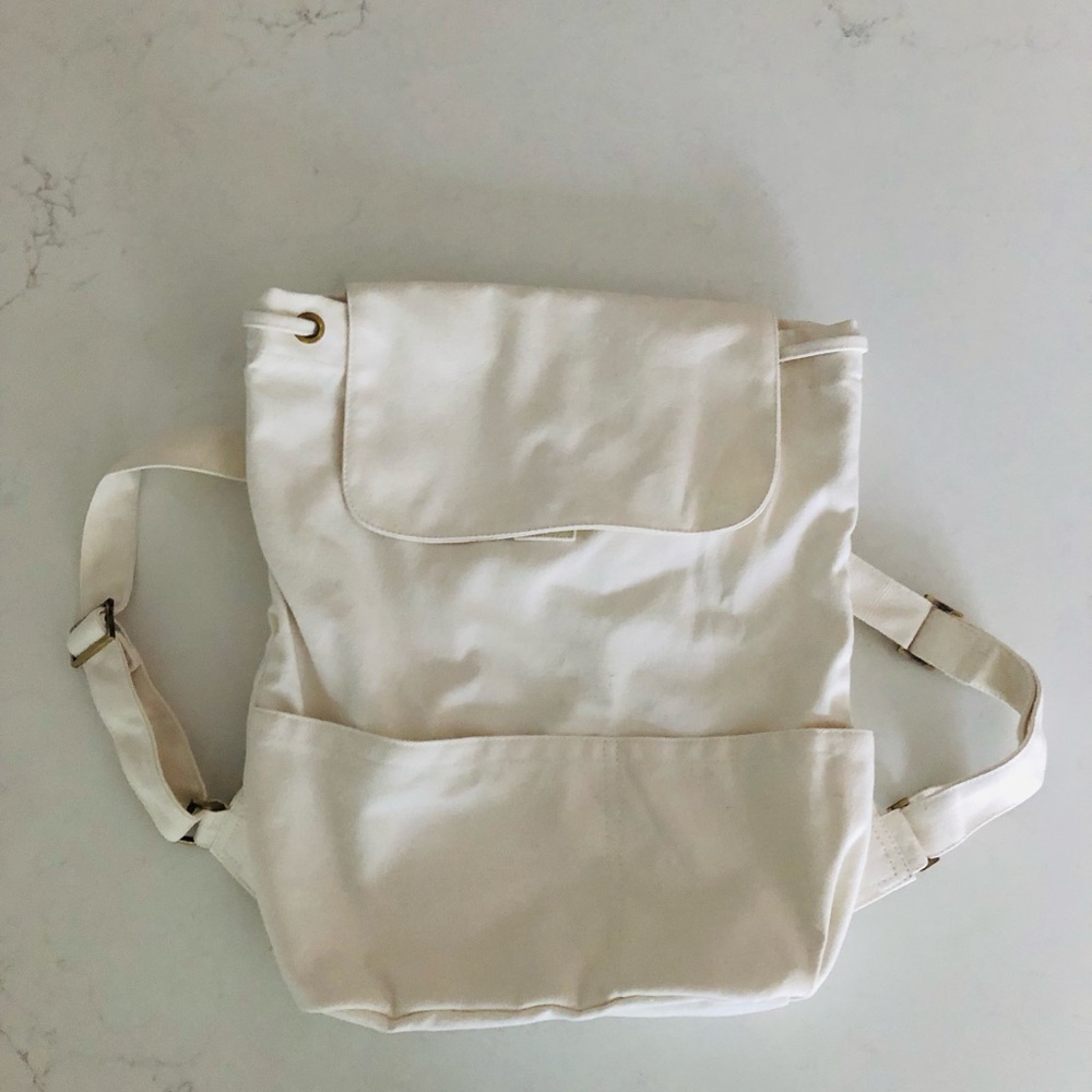 NEW Canvas Backpack with Drawstring and Flap Closure, Laude the Label